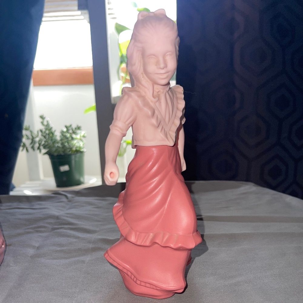 Vintage Avon  roll – a – hoop Girl perfume bottle